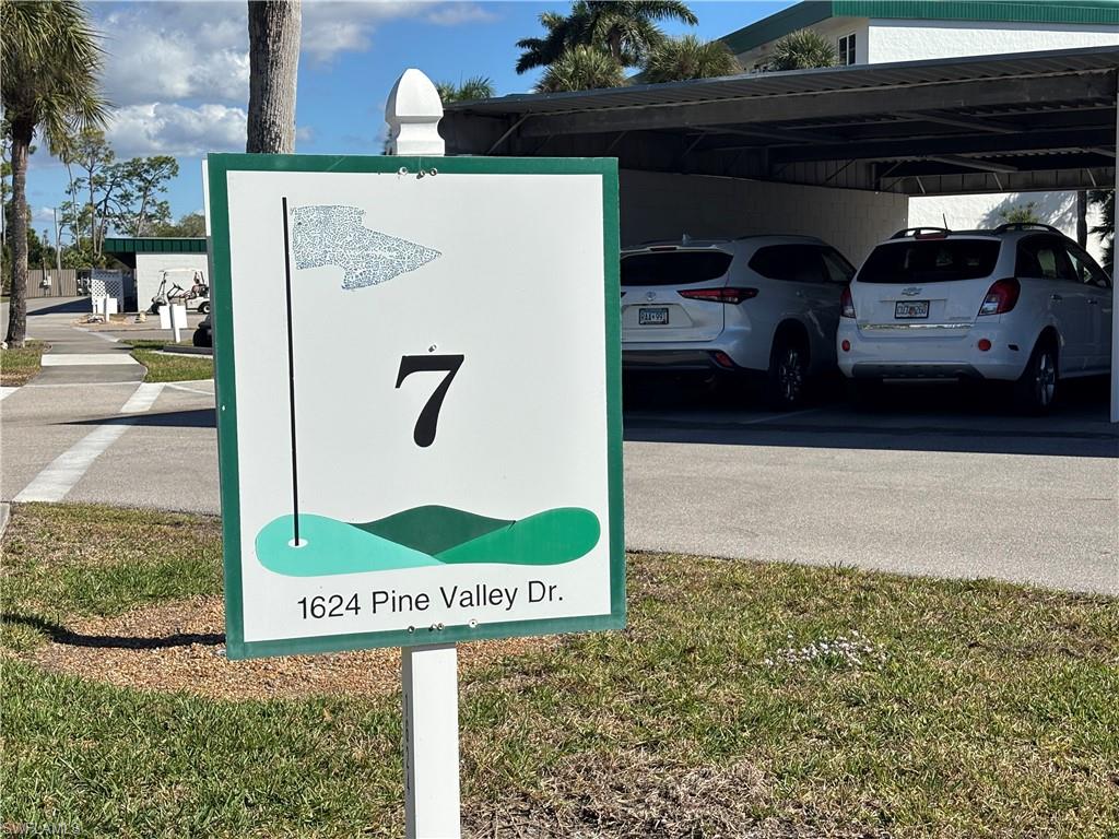 Sign for Building 7. Enter Parking Lot