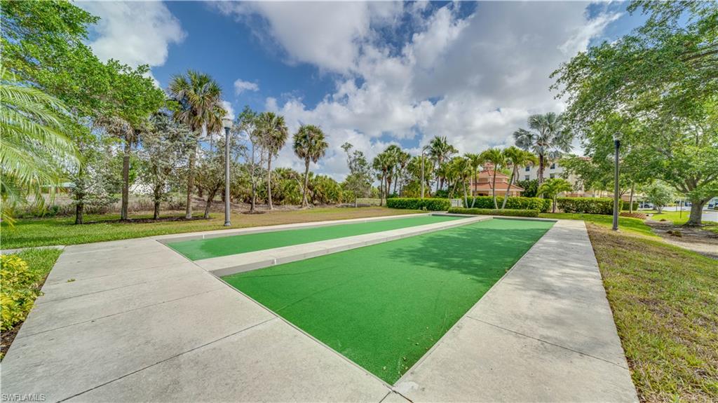 View of property's community with a game area