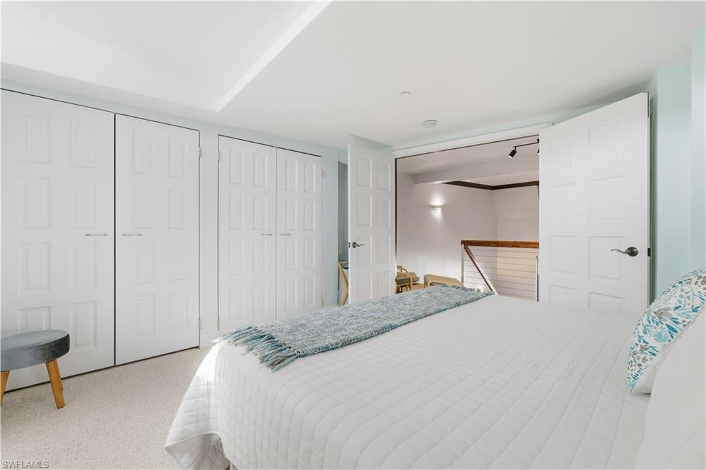 Primary Suite featuring walk in closets