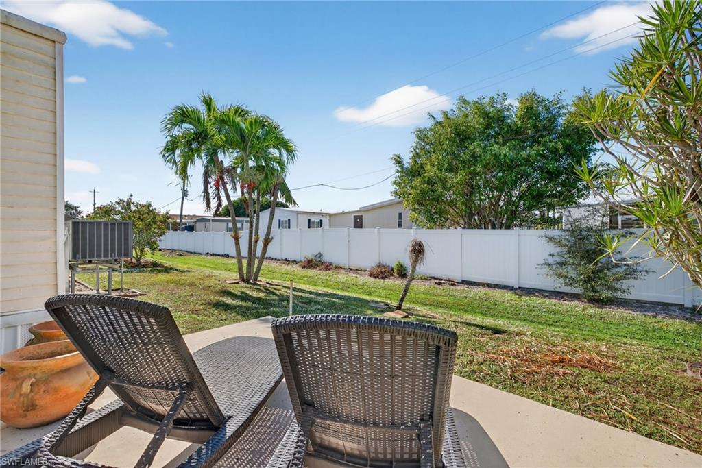 Fenced backyard featuring a patio area