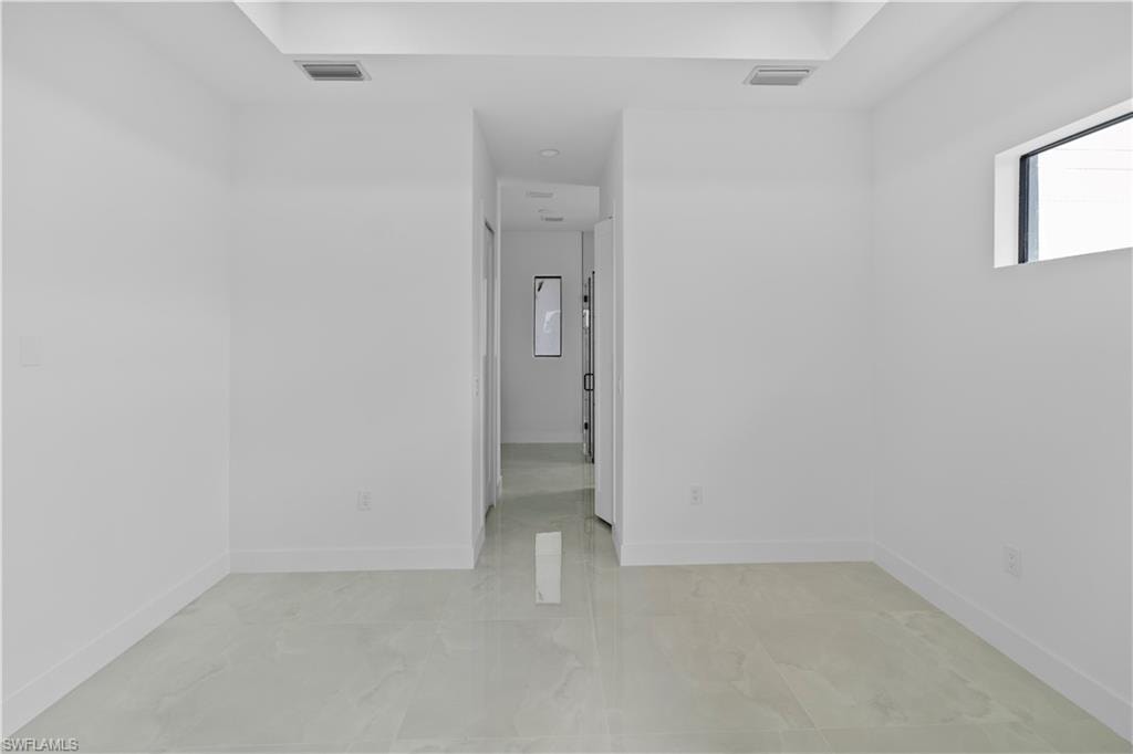 Empty room with baseboards