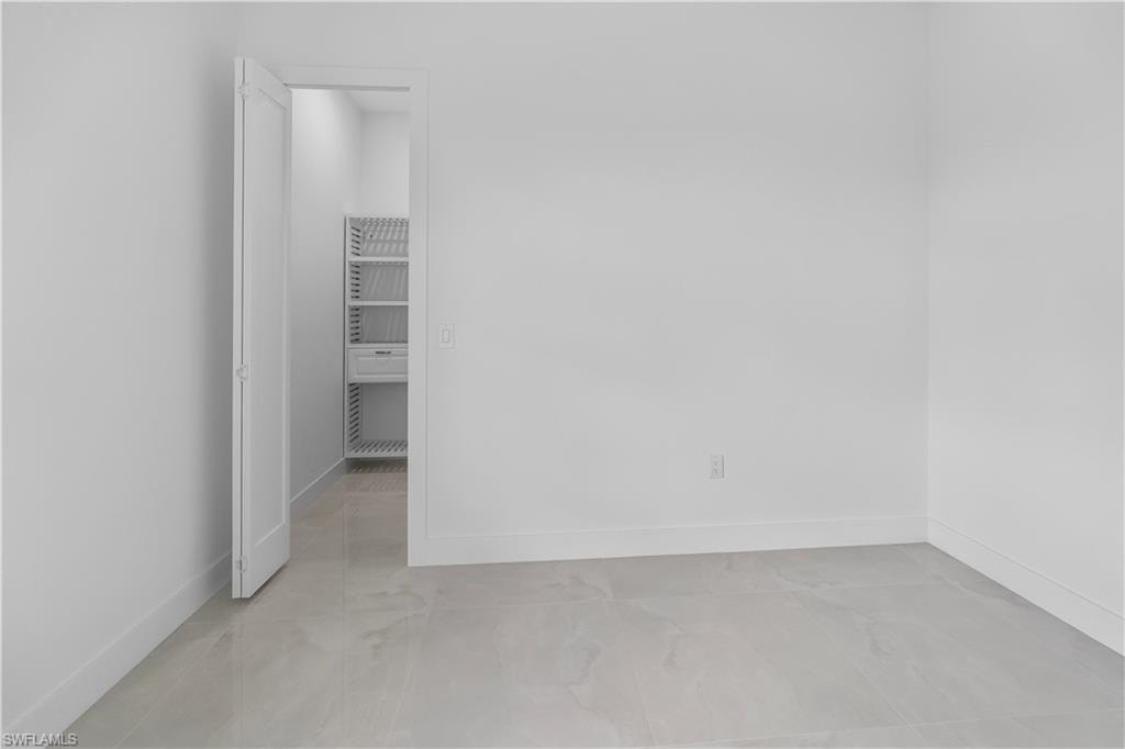 Spare room with baseboards