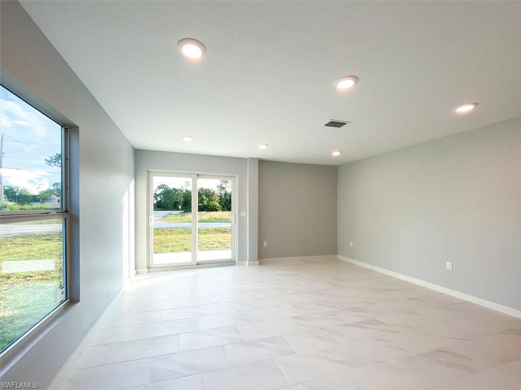 Empty room with recessed lighting
