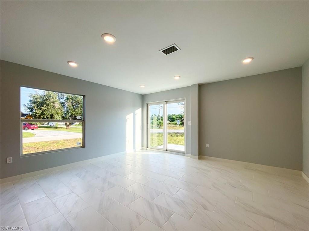 Unfurnished room with recessed lighting