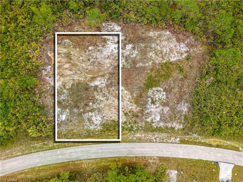 Aerial view of property's location with property parcel outlined