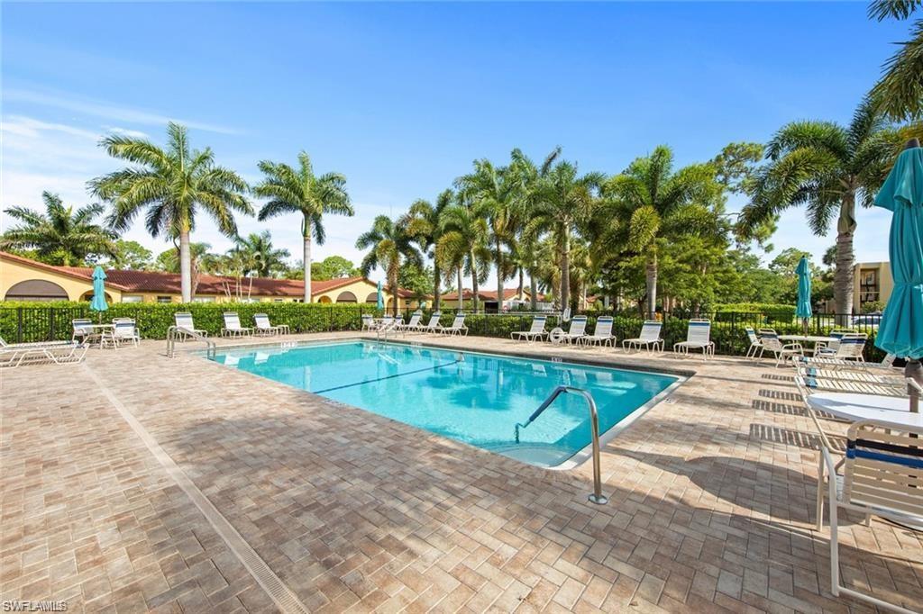 Community pool featuring a patio area