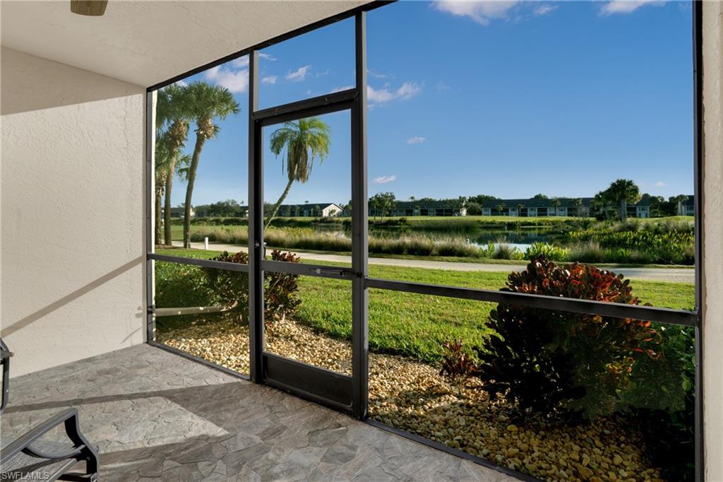 Unfurnished sunroom featuring a water view and healthy amount of natural light