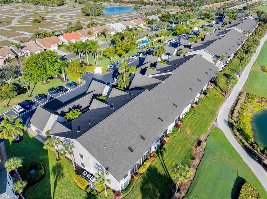 Aerial view of residential area with a large body of water