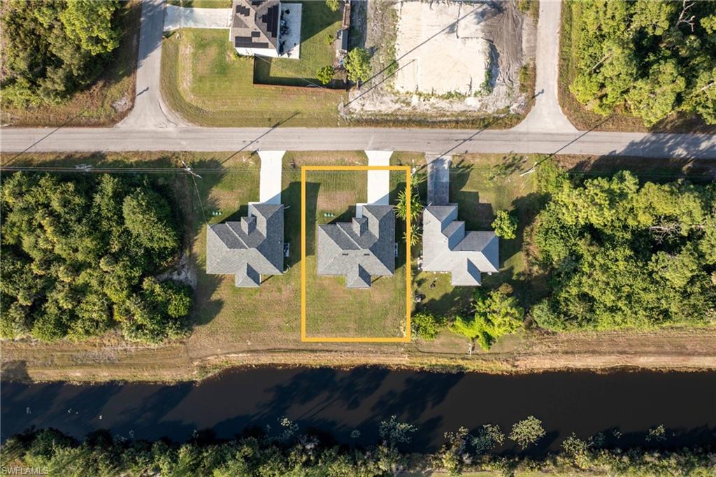 Aerial overview of property's location with property parcel outlined