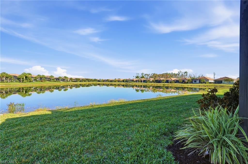 Water view with nearby suburban area