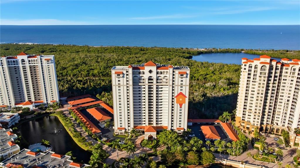 Bird's eye view of a large body of water and apartment complex / building