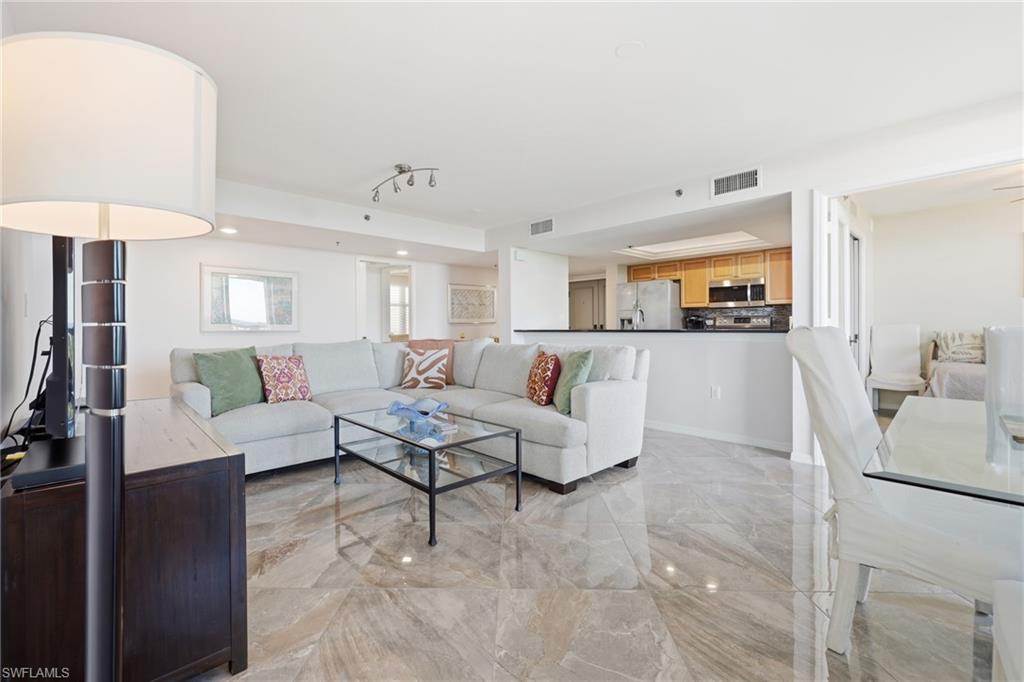 Living room with light marble finish floors