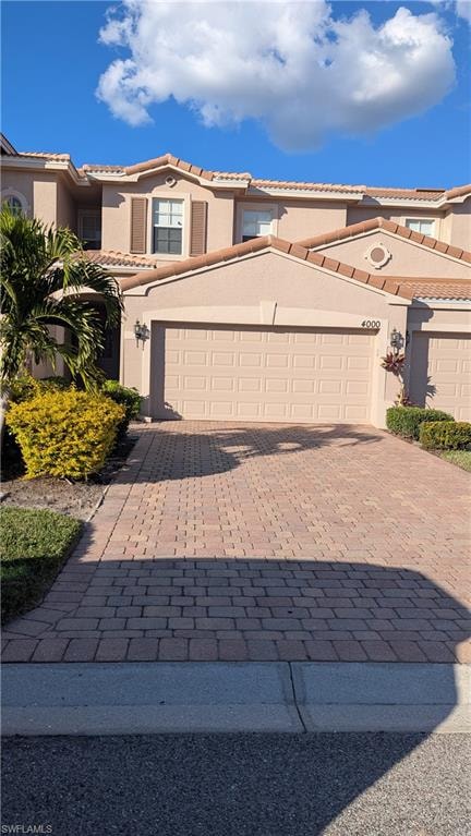 Garage with decorative driveway