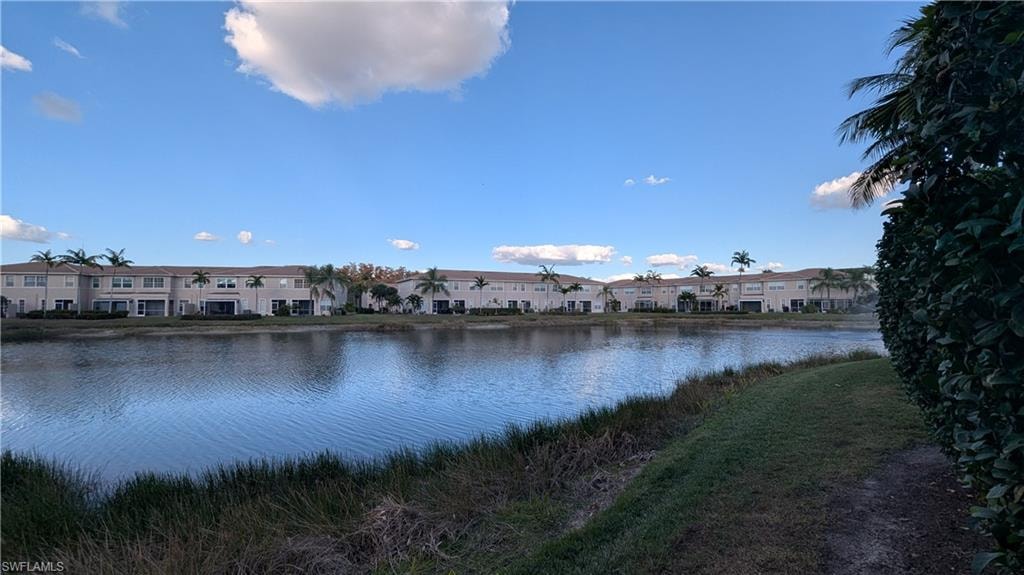 Water view featuring nearby suburban area