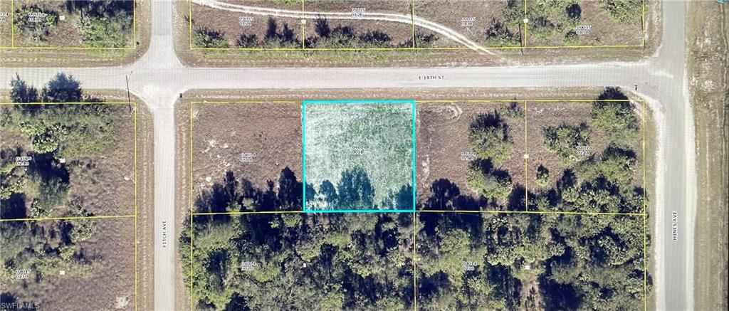 Aerial overview of property's location with property parcel outlined