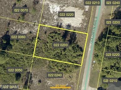 Aerial map of property and surrounding area featuring property parcel outlined