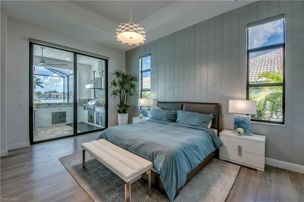 Bedroom with wood finish floors