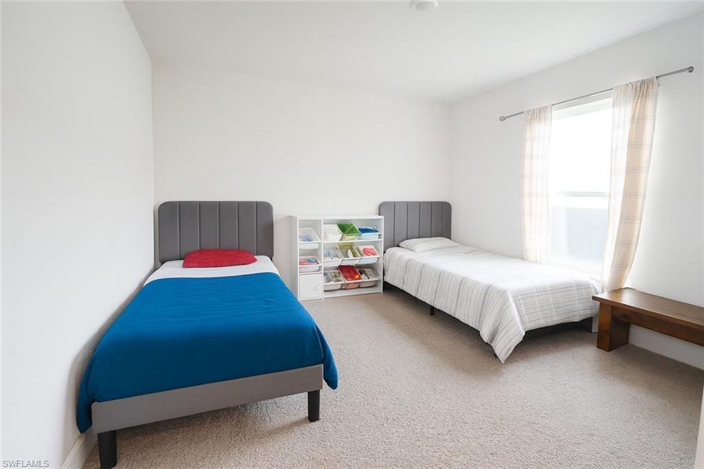 Bedroom featuring carpet floors