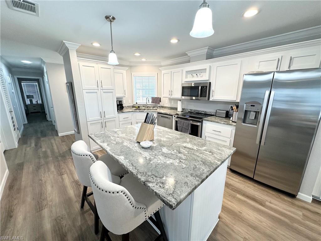 Stainless steel appliances and granite countertops