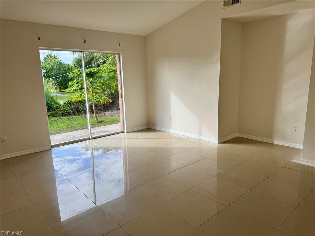 Great room with sliding glass doors to outdoor area