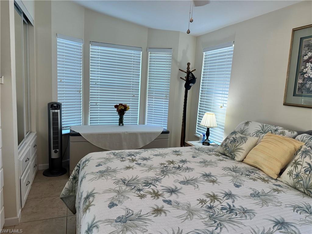 Bedroom featuring light tile patterned floors