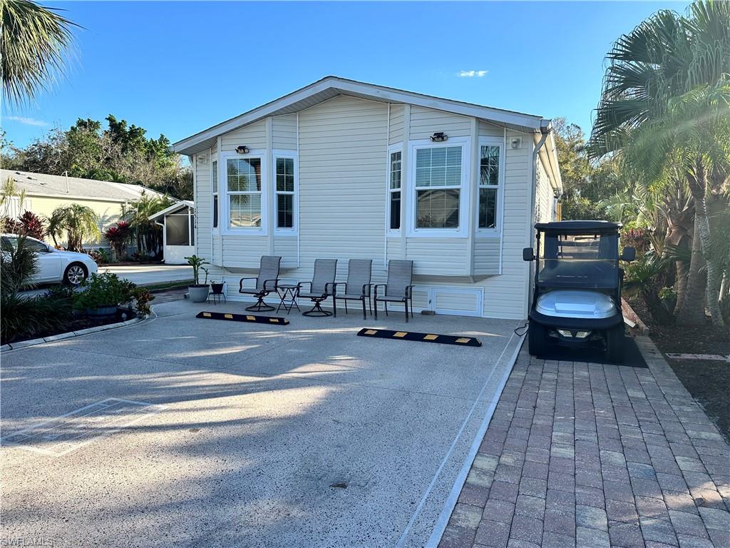 View of front of house with a patio area