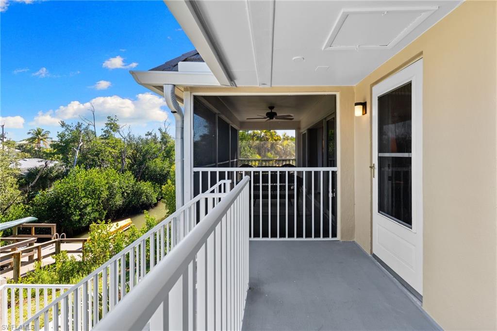 Balcony featuring a ceiling fan