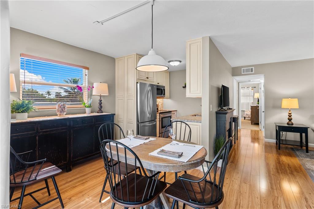 Dining room featuring light wood-style floors