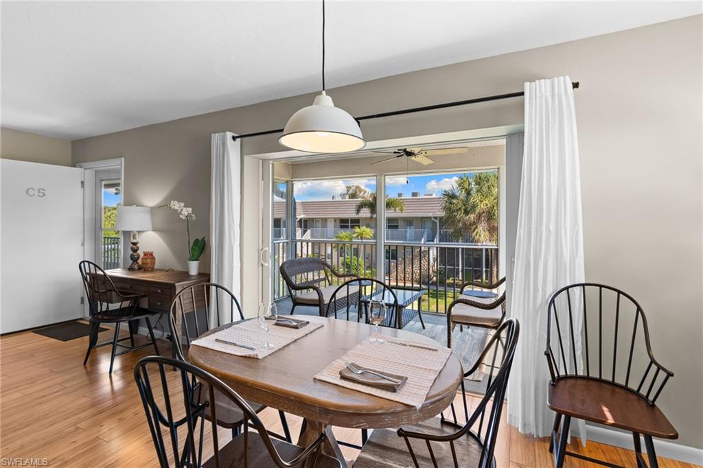Dining room featuring light wood finished floors and ceiling fan