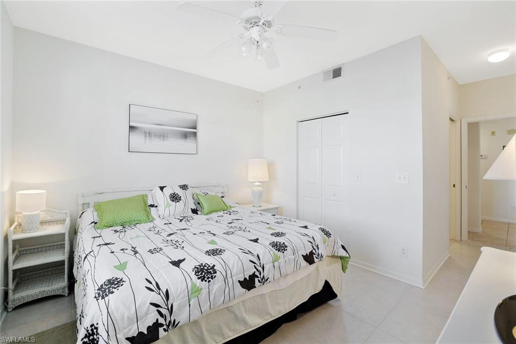 Bedroom with a closet and ceiling fan
