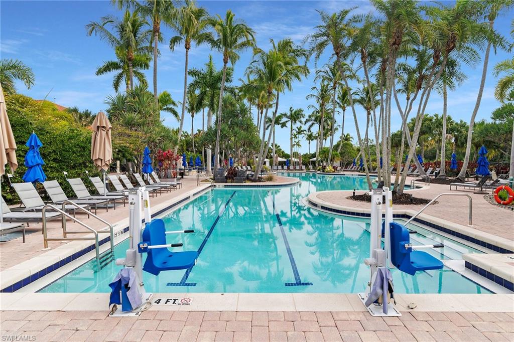 Community pool featuring a patio area