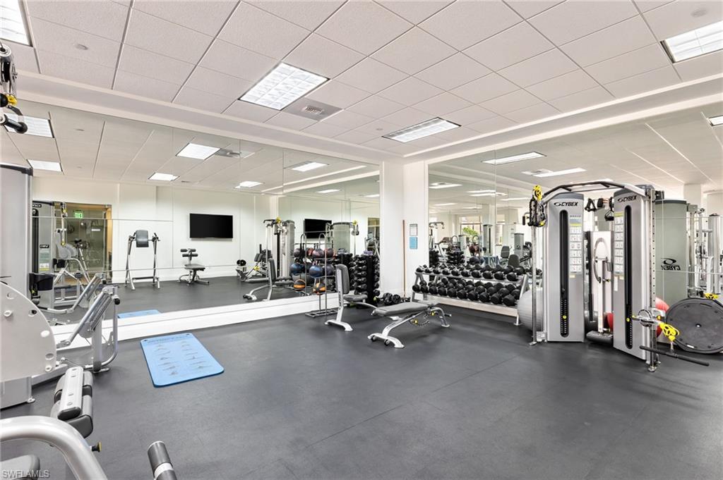 Gym featuring a paneled ceiling