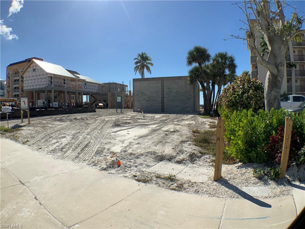 Looking in to lot from right front side corner toward back of lot , concert wall on back lot line Sits on Estero Blvd