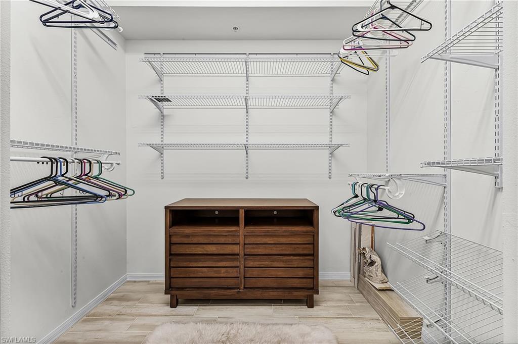 Walk in closet with closet organizers