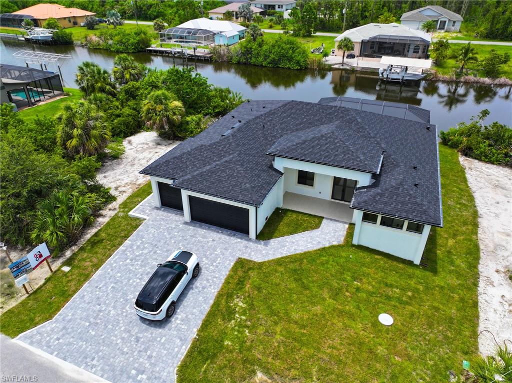 View from above of property with a large body of water