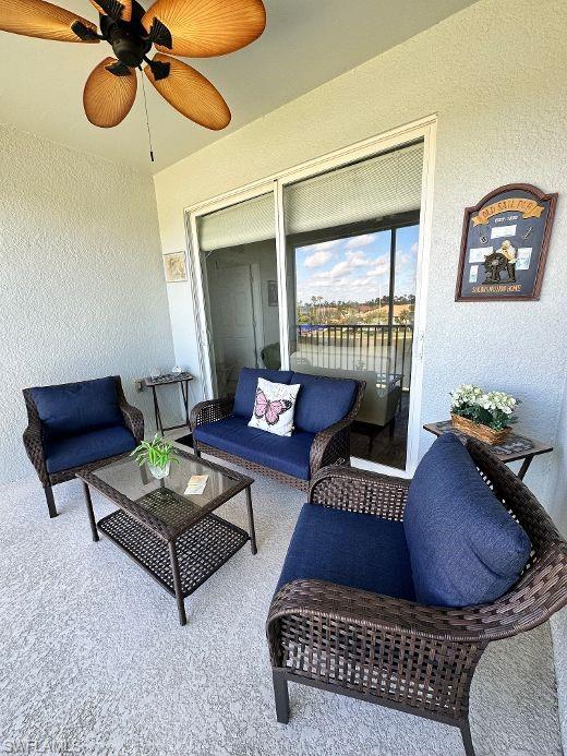 View of patio / terrace featuring an outdoor hangout area and ceiling fan