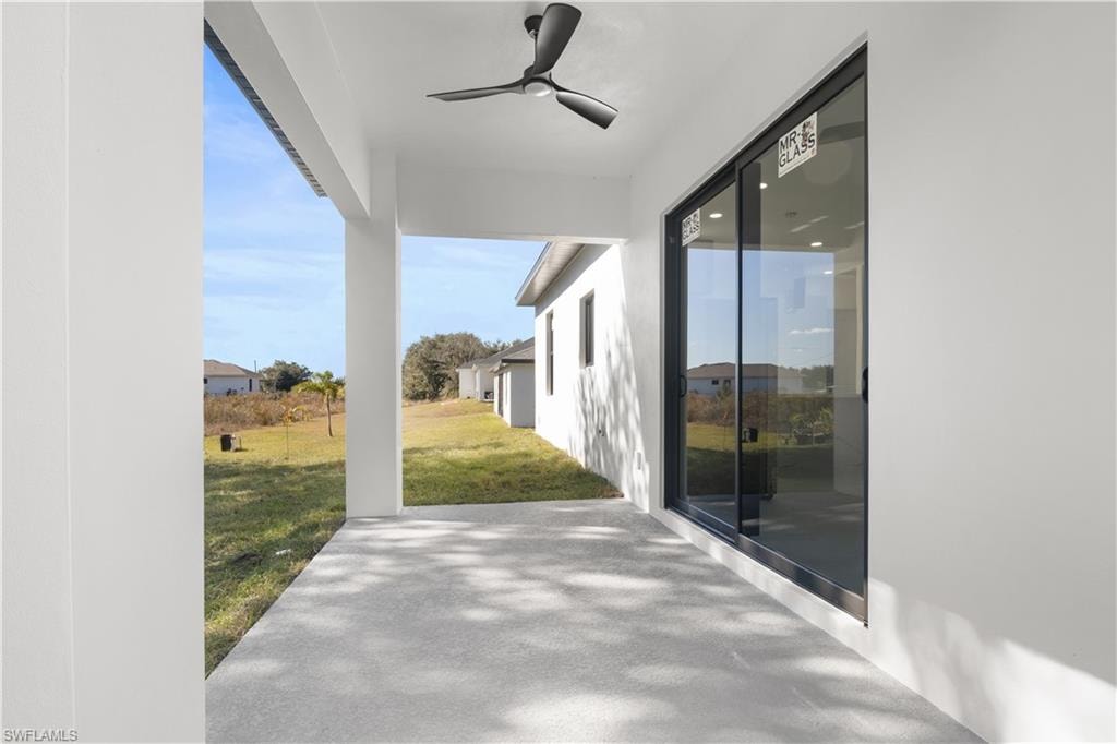 View of patio / terrace with ceiling fan