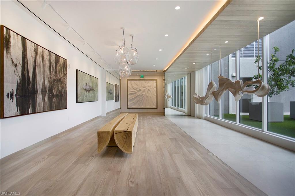 Lobby of Tower 400 with floor to ceiling windows and beautiful artwork.