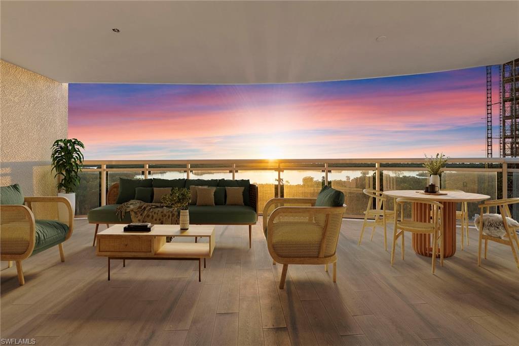 Balcony at dusk with a patio, an outdoor living space, and a water view