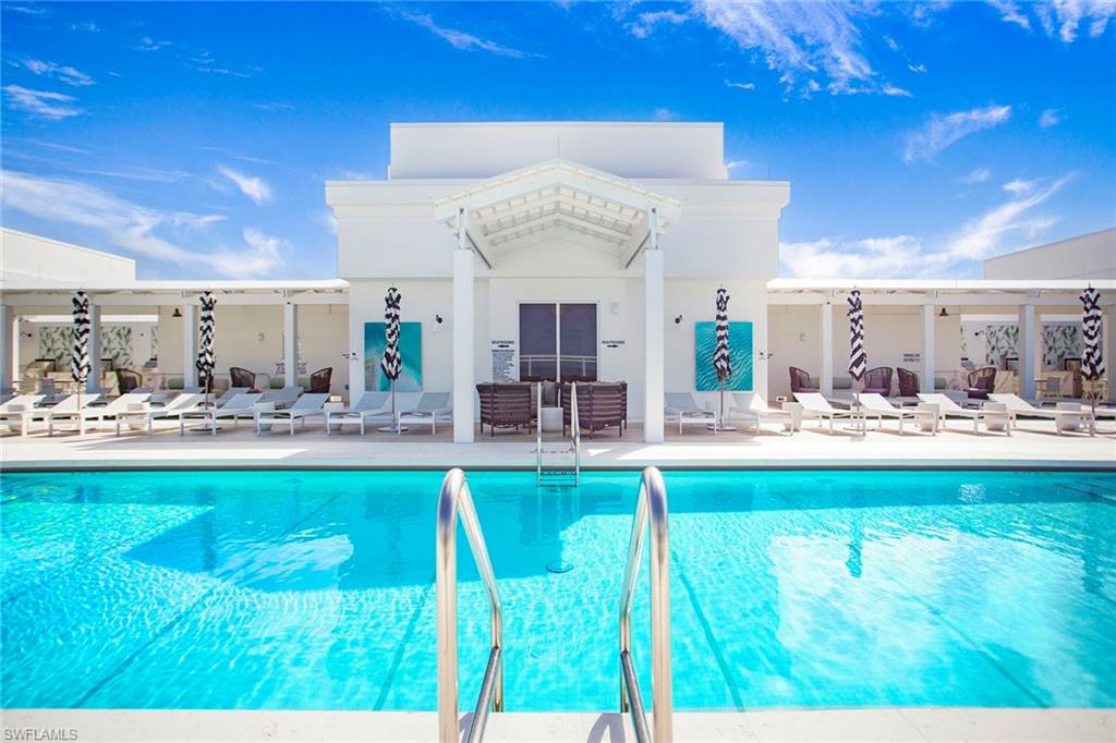 Community pool featuring a patio area