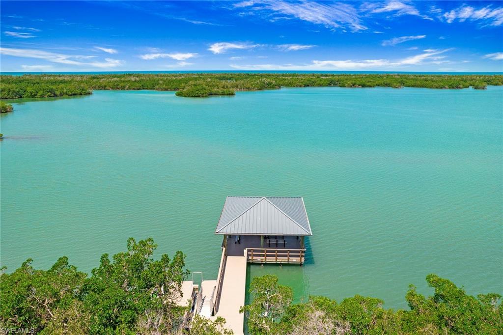 Water view featuring a dock