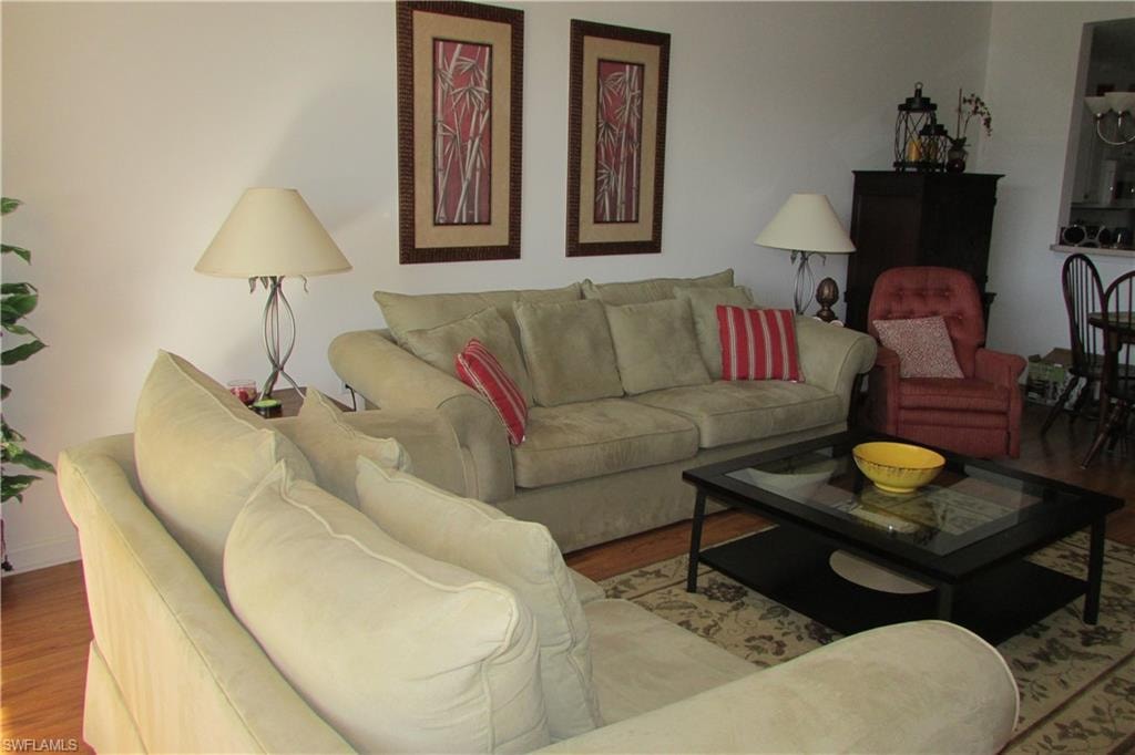 Living room with wood finished floors