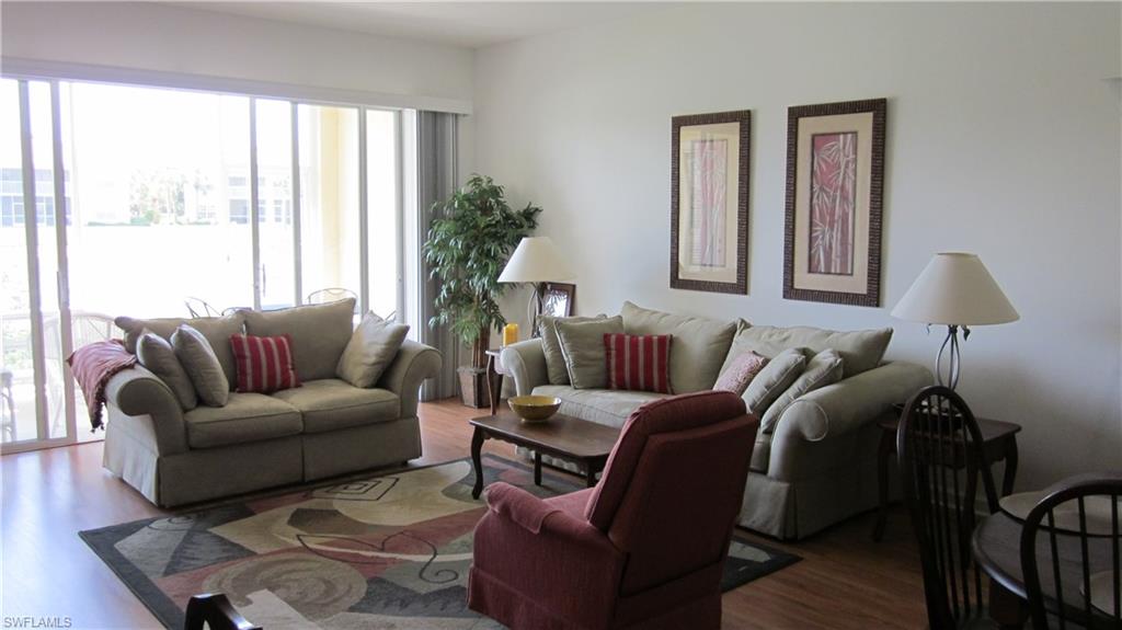 Living area with wood finished floors