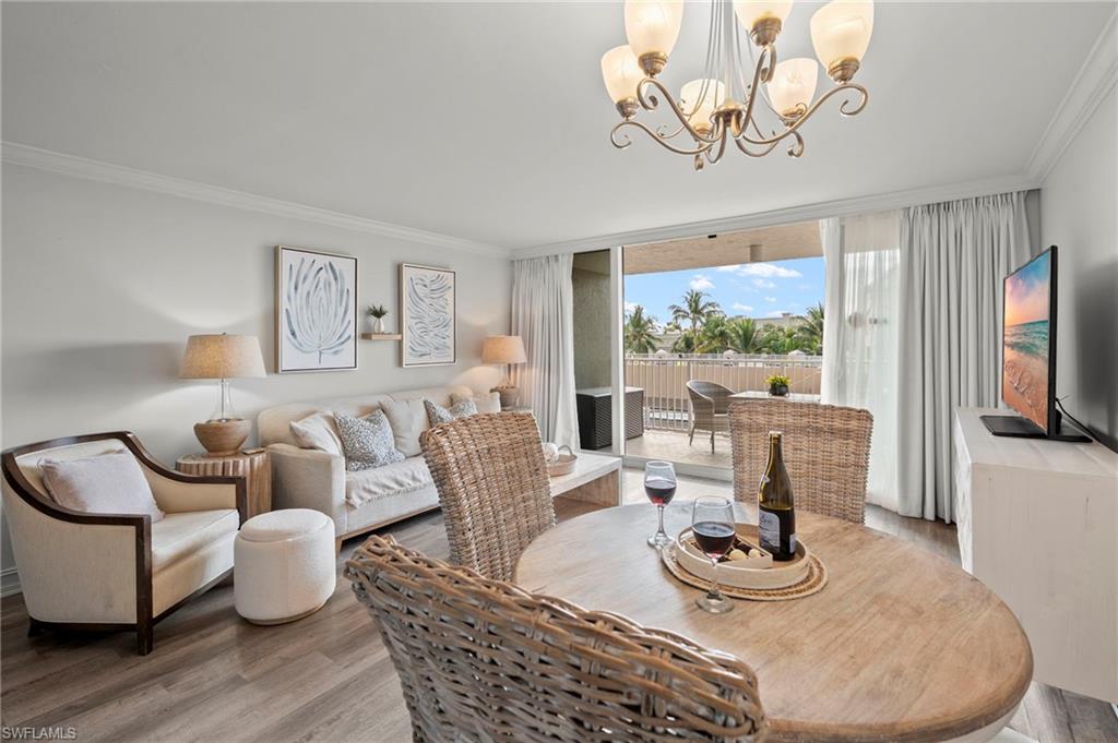 Enjoy a glass of wine while taking in the gulf and palm tree views.