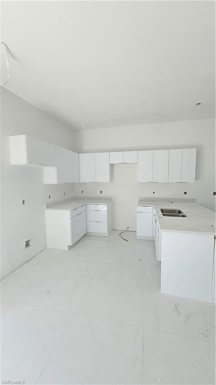 Kitchen with white cabinets