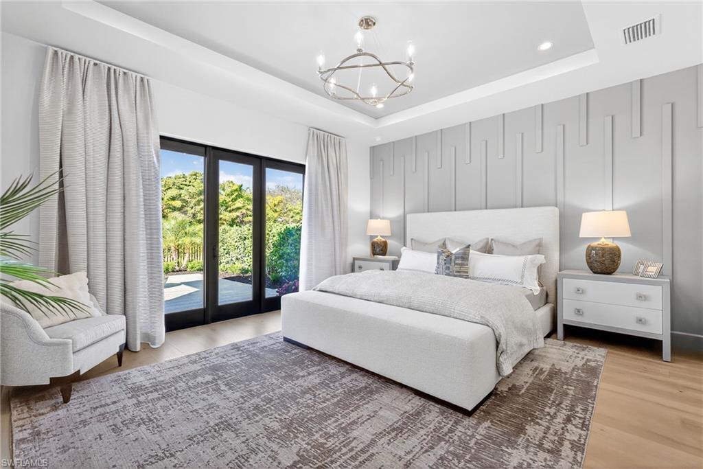 Master suite has plenty of natural light from the large doors which lead to private outdoor patio space.
