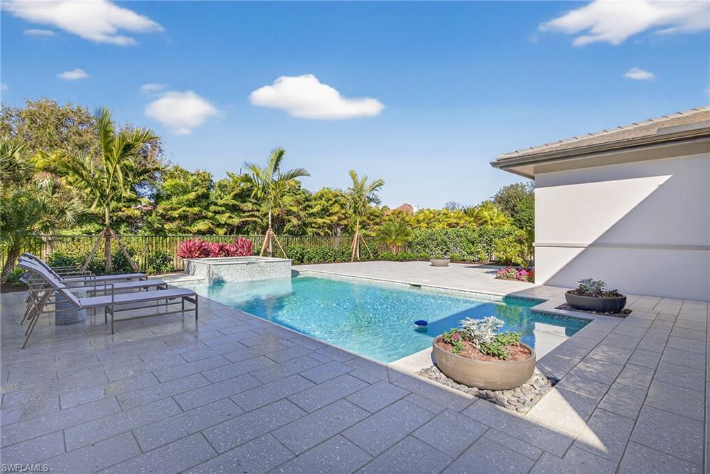 large deck for lounging , outdoor fire pit area