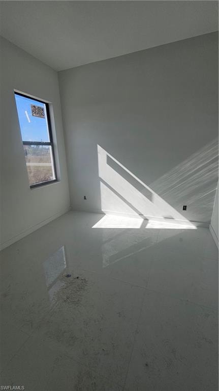 Spare room with baseboards