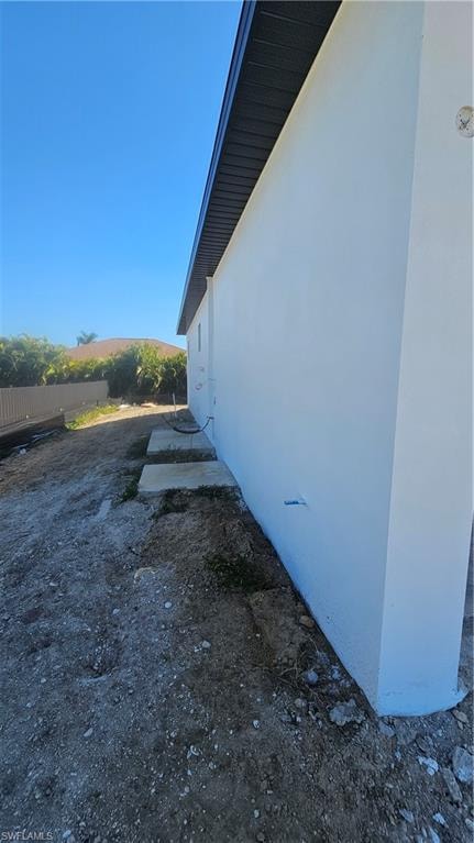 View of property exterior featuring stucco siding