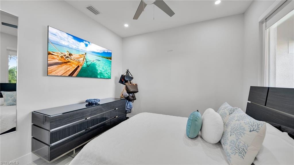 Bedroom featuring recessed lighting and a ceiling fan